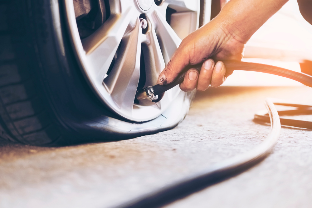 Photo of a flat tire being pumped
